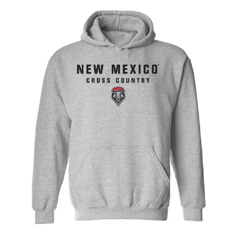 New Mexico - NCAA Women's Cross Country : Mia Torrecillas - Classic Shersey Hooded Sweatshirt Hoodie with Hem Applique Textured Unique